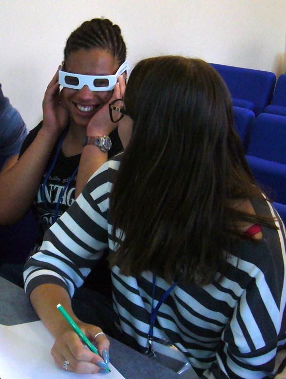 Students at the workshop trying on simulation glasses