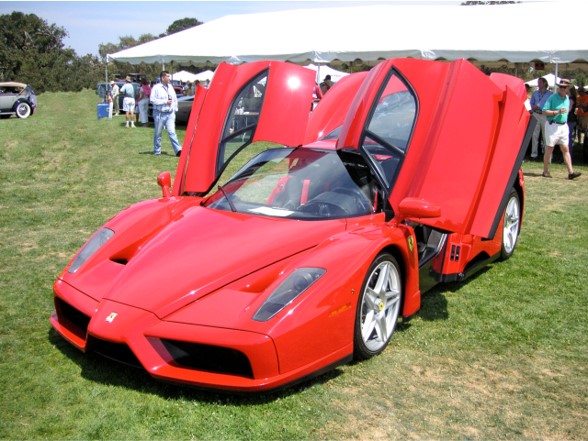 Photo of a Ferrari Enzo with its doors open